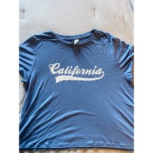 H&M pale blue slightly cropped California t-shirt. Size L.